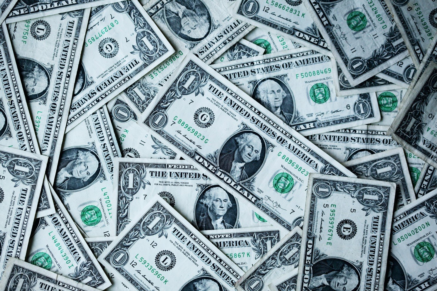 A pile of U.S. one-dollar bills